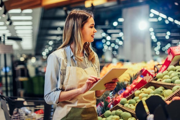 Woman working at a grocery store